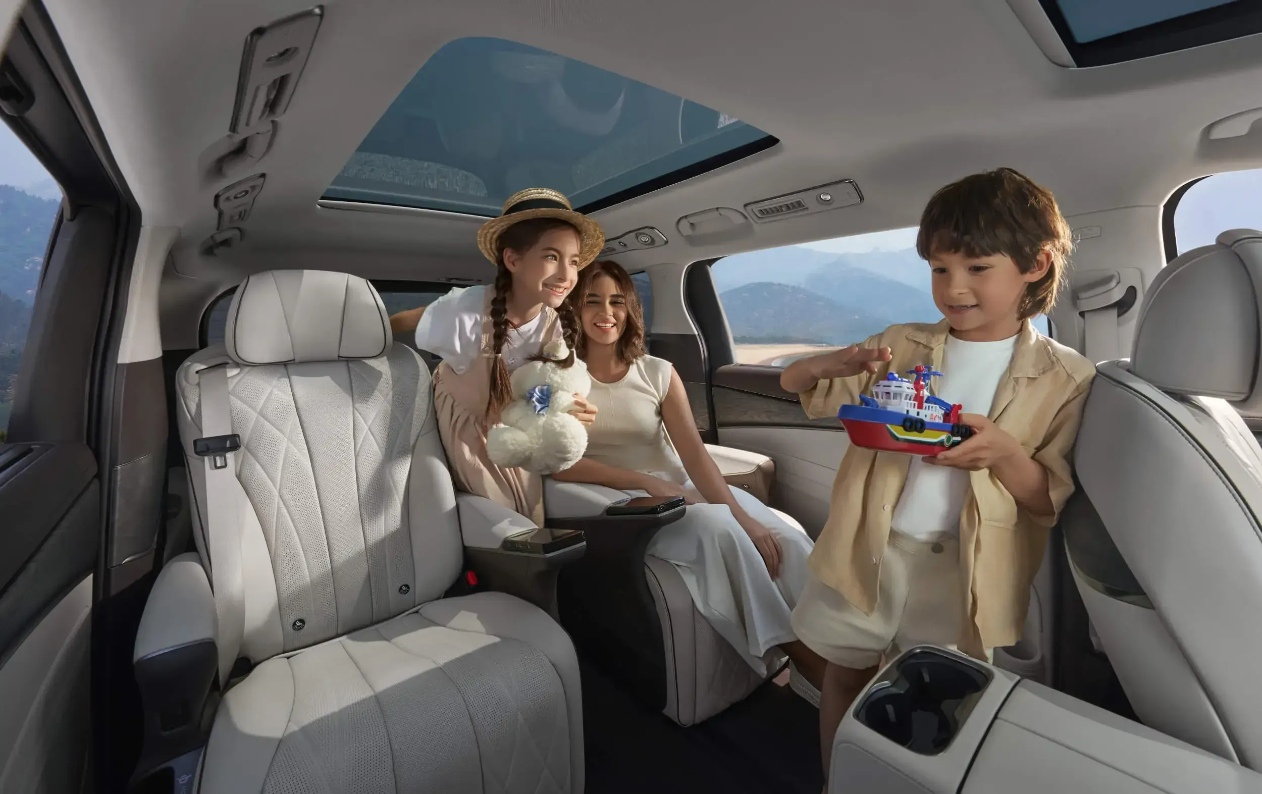 Family enjoying the spacious Denza D9